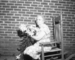 Mrs. A. D. Cunningham with Easter Lily Flower