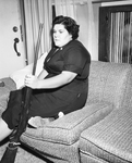 Mrs. Boyd Evans with Rifle she used in an attempt to shoot a stranger