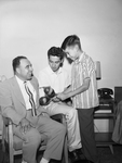 Henry Gonzales with his sons