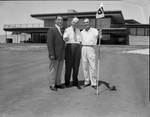 Dick Metz, Marvin Leonard, and Ben Hogan on 18th green of Shady Oaks Country Club golf course