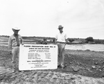 Landowner M. W. Trussell and contractor Joe Duncan