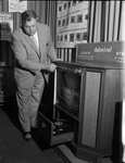 Frank Lathrop of Lone Star Wholesalers, demonstrates new Television
