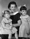 Mrs. M. M. Meushaw with children Merrily, 5, and Dianne3 pres. of Petroleum Engineers Auxiliary