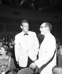 Movie actor Guy Madison, top left, talks with Melvin Dacus, producer of Casa Manana Musicals, opening night of "Can-Can" at Casa Manana, 07/05/1958