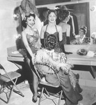Three "Can-Can" show girls in dressing room of Casa Manana