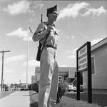 On the Alert: Airman 3/C Robert Henderson,Â Carswell Air Force BaseÂ walks guard duty