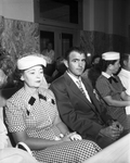 Mrs. Agnes Kirk and her husband listen attentively during the probate hearing on the disputed J. E. Sexton will which named Mrs. Kirk chief beneficiary of a multimillion dollar estate by Tony Record