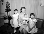 Visiting parents Mrs. Walter G. Griffith, Akron , with children Barbra Walter and Catherine