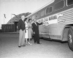 Waco Casa Manana Special. . . l-r L. B. Gardner, Mrs. Fred W. Cress, Mrs. Dan LeBow, and I. A. Dryden, Jr. with bus that brought 33 Waco people to see "Carousel"