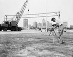 This 80-foot sign "bridge" is being erected by the State Highway Department on the West Freeway by Bob Bain