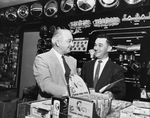 S. F. Grubbs and Peter Lafontaine prepare to meet new customers at the newly opened Kragen Auto Supply No. 6