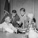 County Chairman Davey O'Brien and Parliamentarian Tom Law discuss rule of voting by proxy