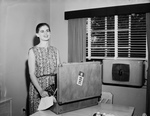 Mrs. Sterling Steves Unpacking after Her Honeymoon