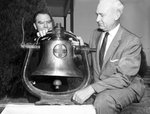 From Engine to Steeple: Father Charles L. Mulholland with L. M. Olson with Locomotive Bell Presented to Church