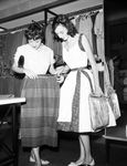 Vicki Branch and Sister Peggy Branch Admire a Skirt