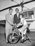 Cheryl Kay Smith, Cerebral Palsy Patient Testing a Bike Presented to Her by George Cayce and Robert F. Scott