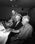 Gene E. Jameson, Major General Carl Phinney, and Oran Stovall Working Out the Program for the 36th Division Association Convention