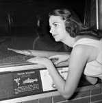 Linda Ligon with "Golden Ghost Gar" at James E. Record Aquarium