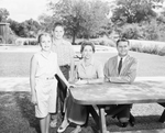 Mr. and Mrs. Everett Hutchinson with their children