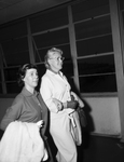 Elisabeth Bermann, and Nurse Rose Haupt at airport. by Tony Record