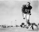 Texas Tech lineman. E. J. Holum, 55, posed action