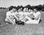 Football Carter Riverside. Paula Gorbett, Linda Richardson, Sally Lange and Glenda Yeargan, cheerleaders with Bill Kemp, halfback by Al Panzera