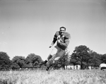Jerry Terrell, Carter Riverside halfback, posed action
