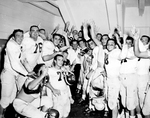 Texas Christian University (TCU)-Kansas football action. Texas Christian University (TCU) football players in dressing room after game