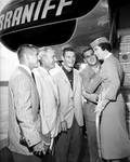 Texas Christian University (TCU) Frogs leaving for Iowa. Marvin Lasater, Coach Allie White, Dale Walker, Donald Floyd and American Airlines stewardess Ruth Gresham by George Smith