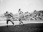 Texas Christian University (TCU)-Baylor football action. Farrell Fisher intercepting a pass with Billy Pavliska by George Smith