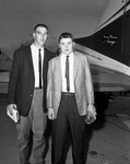 Arkansas players arrive. Charlie Barnes and Richard Bell at airport