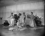 Judy McVeigh, Patricia Penrose, Mrs. Elton Hyder, Jr., and Mrs. J. A. Durkin in festival costumes