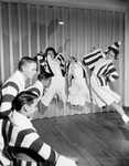Texas Christian University (TCU) cheerleaders. Jimmy Davis, Joel Hurley, Buddy Blake, Jan Goodman, Sandy Stokes and Cloe Rountree by George Smith