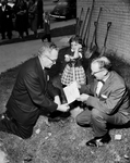 Arlington Heights Baptist Church. J. D. Ballard, Cheryl Wilson, 5, and Leonard L. Polk with old note and shovel for new educational building ground-breaking