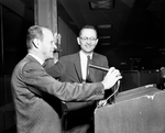 Radio convention. Bob Schenkkan, Austin, left, and Charles H. Tower, Washington, speakers
