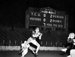Wog-A&M Freshmen football game. Guy Gibbs knocking down pass from Frank Fisher by George Smith