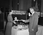 left to right. R. B. Yanaway Mrs. J. L. Pinkard and Richard Titsworth for Brawley, California at booth in Hotel Texas lobby