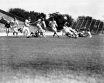 Texas Christian University (TCU)-Texas A&M football game. Bubba McLean, Aggie, with ball with Hunter Enis tackling by Joe McAulay