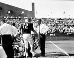 Texas Christian University (TCU)-Texas A&M football game. Kenneth Beck talking to Coach Jim Meyers during game by Joe McAulay
