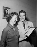 Reserve Lt. Col. and Mrs. Robert W. Creamer with certificate of appreciation presented him from Tulsa
