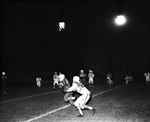 Carter Riverside- North Side football action. Don Tallman intercepting pass with Hugh Dean at right