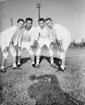 Keller football, posed. Pat Simpson, Tim Hightower, Dale Yates and Mike Lester