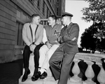 Air Force Academy teammates talk Texas. Mike Rawlins, right from Lancaster tells Bob Brickley, left and Team Captain Brock Storm, center about Texas by Al Panzera
