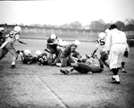 Football action, Amon Carter Riverside vs. Jefferson in Dallas by Bob Bain