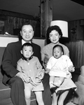 Dr. and Mrs. Wellington Loh With Their Children Wellington Loh, Jr. and Victoria