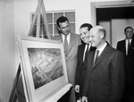 R. M. Ort, City Councilman Tommie Thompson, and J. C. Pace Look at Artist's Conception of Sears Roebuck South Side Shopping Center