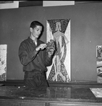 Jimmy Clark Carves a Basketball Player from Wax in an Art Course at Carter Riverside High School