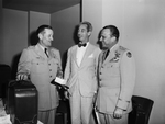 General Roger M Ramey, left and others two unidentified