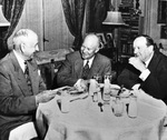 Sid Richardson, Amon Carter, and Dwight Eisenhower enjoying a meal
