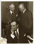 Amon G. Carter Sr. talking with Dwight Eisenhower; Sid Richardson is seated